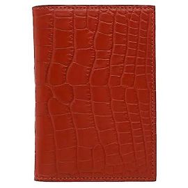 Hermès The Hermes MC2 Euclide card wallet showcases the three-dimensional grain and glamorous texture distinctive to top-grade alligator leather. Its slim, compact silhouette efficiently separates and Orange