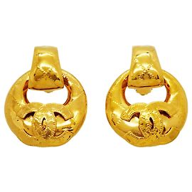 Pendientes de clip Chanel chapados en oro Dorado
