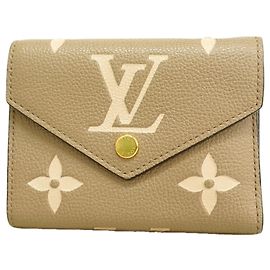 Portafoglio Tri-fold Louis Vuitton in Tourterelle e Cream Grigio Crudo