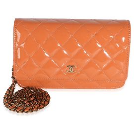 Cartera Chanel Classic Wallet On Chain de charol acolchado naranja oscuro Naranja