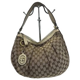 Gucci Sukey Bolsa Hobo em Tela Monogramada GG Marrom Bege