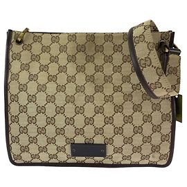 Borsa a tracolla Gucci GG Canvas con ciondolo a placca Marrone Beige