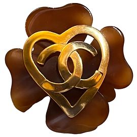 Spilla a forma di cuore trifoglio in resina e placcato oro Chanel CC Altro