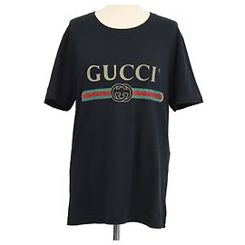 Camiseta de cuello redondo Gucci de algodón negro con estampado de logotipo y efecto desgastado Negro