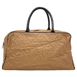 Sac Boston Chanel Matelassé en veau grainé Marron Noir