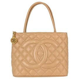 Chanel Medallion Quilted Caviar Beige