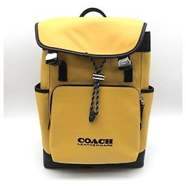 Mochila con solapa COACH League en Yellow Amarillo