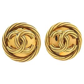 Boucles d'oreilles clips rondes torsadées Chanel CC plaquées or Doré