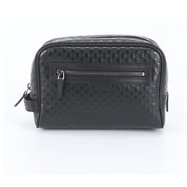Pouch Gucci Micro Guccissima GG in pelle Nero