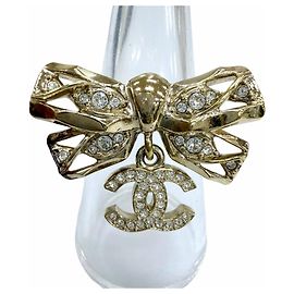 Anillo Chanel B24B Coco Mark Ribbon Rhinestone Dorado