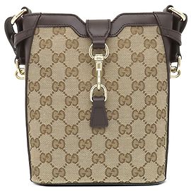 Mini sac seau Gucci en toile GG beige avec bande Web Beige