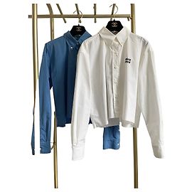 Top Miu Miu in cotone blu Altro