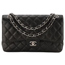 CHANEL - Bolsa de ombro Classique/Timeless Jumbo Chanel em couro caviar preto Preto
