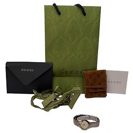 Reloj de pulsera Vintage Gucci de acero inoxidable finales de los 1990 Silver Cream Plata
