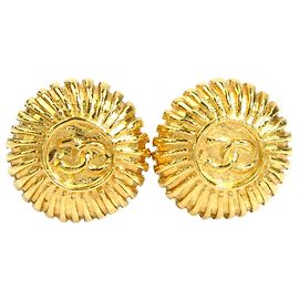 Brincos de pressão Chanel CC banhados a ouro com design sunburst Dourado
