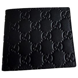 Gucci Portafoglio con patta GG Emblem pelle nera Nero