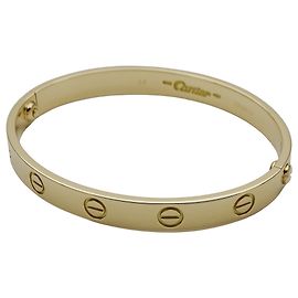 Pulsera de amuletos Cartier en oro amarillo Dorado