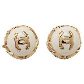 Pendientes de clip Chanel Coco Mark Blanco Dorado