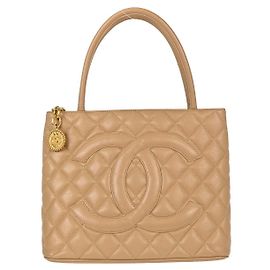 Chanel Medallion Quilted Caviar Beige