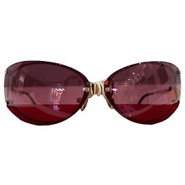 Occhiali da sole Cartier Metallo color oro Rosso D'oro