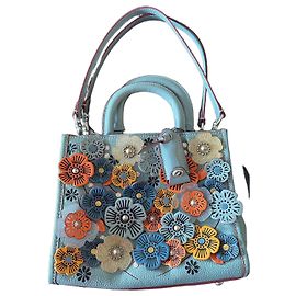 Bolsa Coach em couro azul com aplicações florais Azul Outro Laranja Amarelo