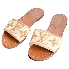 Louis Vuitton Lock It Sandalias Monogram Rafia Castaño Beige