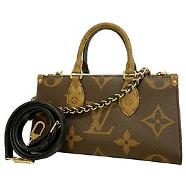 Bolso de mano OnTheGo EW con cadena Monogram Giant Reverse Louis Vuitton Castaño