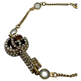 Bracciale con ciondolo motivo Double G e chiave GUCCI D'oro