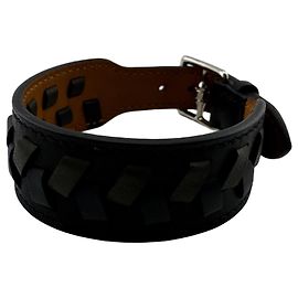 Hermès Bracelet grumeau HERMES Etrivière en cuir perforé Noir