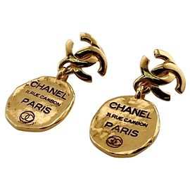 Orecchini a clip Chanel 31 Rue Cambon placcati in oro D'oro