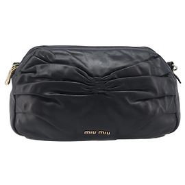 Miu Miu Mini Sac à épaule en cuir Matelassé Noir
