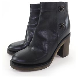 Botines cortos de piel de cordero CHANEL con cierre giratorio Double COCO Mark Negro