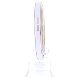 Miu Miu Pulsera blanca y dorada Blanco