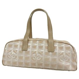 Sac à main Chanel New Travel en nylon, beige Beige