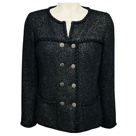 Giacca Chanel in tweed bouclé nero con bottoni logo CC Nero