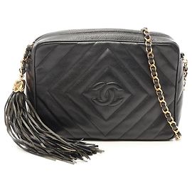 Sac à bandoulière Chanel Diamond Stitch avec pompon Noir