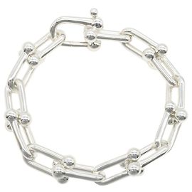 Autre Marque Tiffany & Co. Silberarmband mit Anhängern Silber