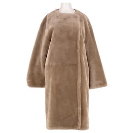 Totême Beiger Shearling-Mantel Beige