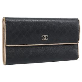 Portafoglio lungo bicolore CHANEL in pelle nera e argento CC Altro