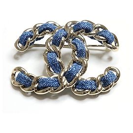 Broche de denim Chanel Coco Mark Plata Azul