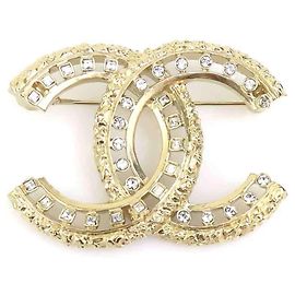 Broche Chanel Coco Mark Prata Dourado