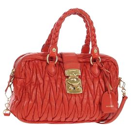 Mala Convertible Coffer Miu Miu em Pele Matelassé Medium Laranja