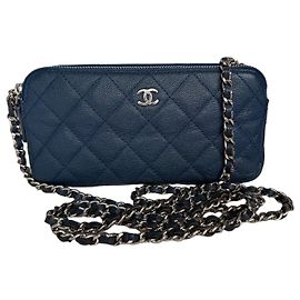 Chanel Wallet on Chain (WOC) in pelle caviar matelassé Blu Navy Blu