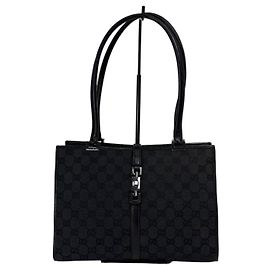 Bolsa Gucci GG Supreme em tela monogramada preta