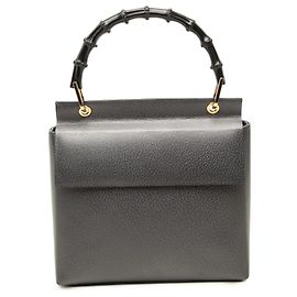 Bolsa Gucci em couro preto com alça Bamboo Preto