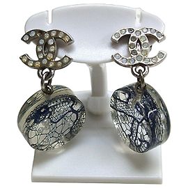 Pendientes de círculo transparentes Chanel Coco Mark Swing Blanco