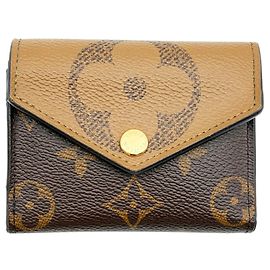 Cartera Louis Vuitton Tri-fold Zoe Castaño Beige