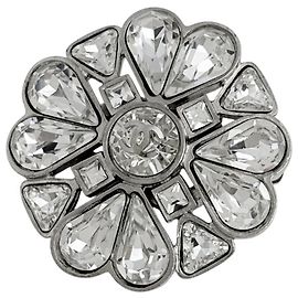 Broche Chanel plaquée argent et strass Argenté