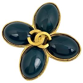 Broche Chanel plaquée or avec pierre colorée Doré Vert