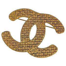 Broche Chanel plaquée or Doré